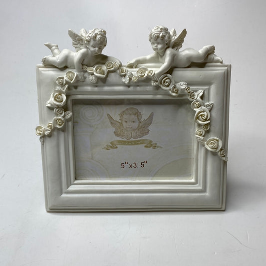Weiße Bilderrahmen mit Engels und Rosen Motiven